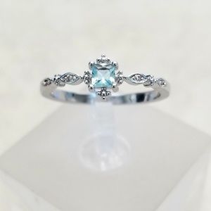 Delicate Topaz Ring